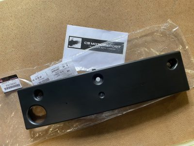 6430A062 Porte plaque pare choc avant E9